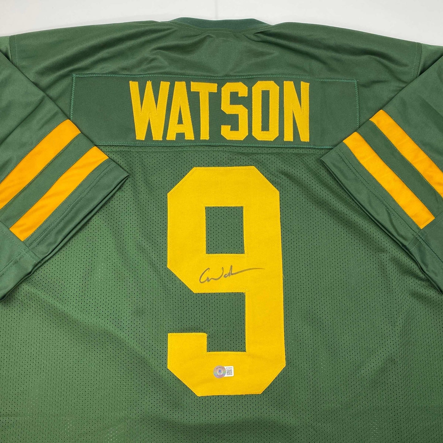 Autographed/Signed Christian Watson Green Bay Color Rush Green Football Jersey Beckett BAS COA