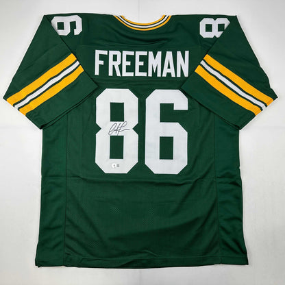 Autographed/Signed Antonio Freeman Green Bay Green Football Jersey Beckett BAS COA