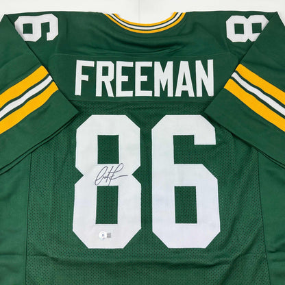 Autographed/Signed Antonio Freeman Green Bay Green Football Jersey Beckett BAS COA