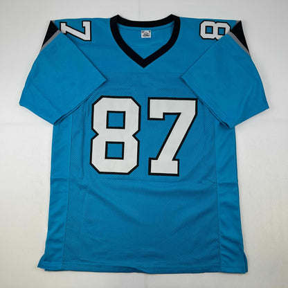 Autographed/Signed Muhsin Muhammad Carolina Blue Football Jersey Beckett BAS COA
