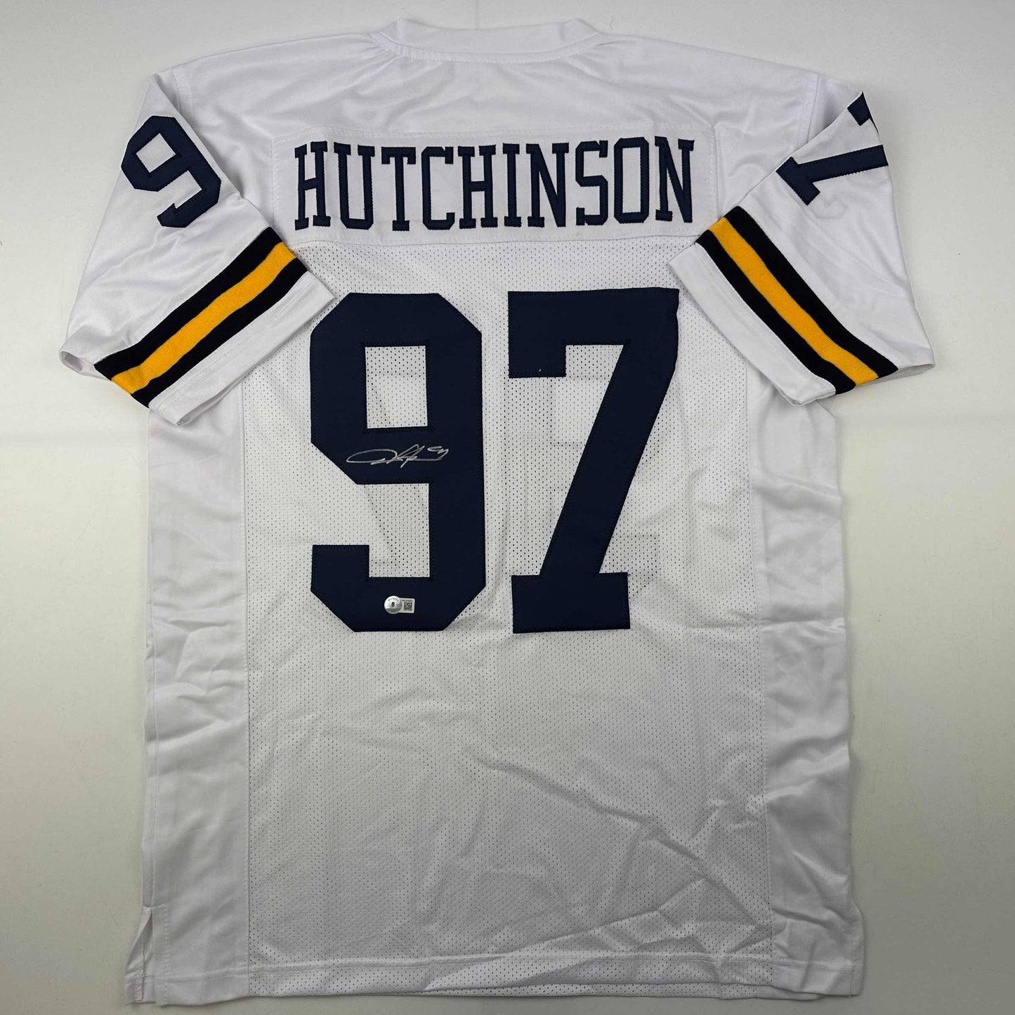 Autographed/Signed Aidan Hutchinson Michigan White College Football Jersey Beckett BAS COA