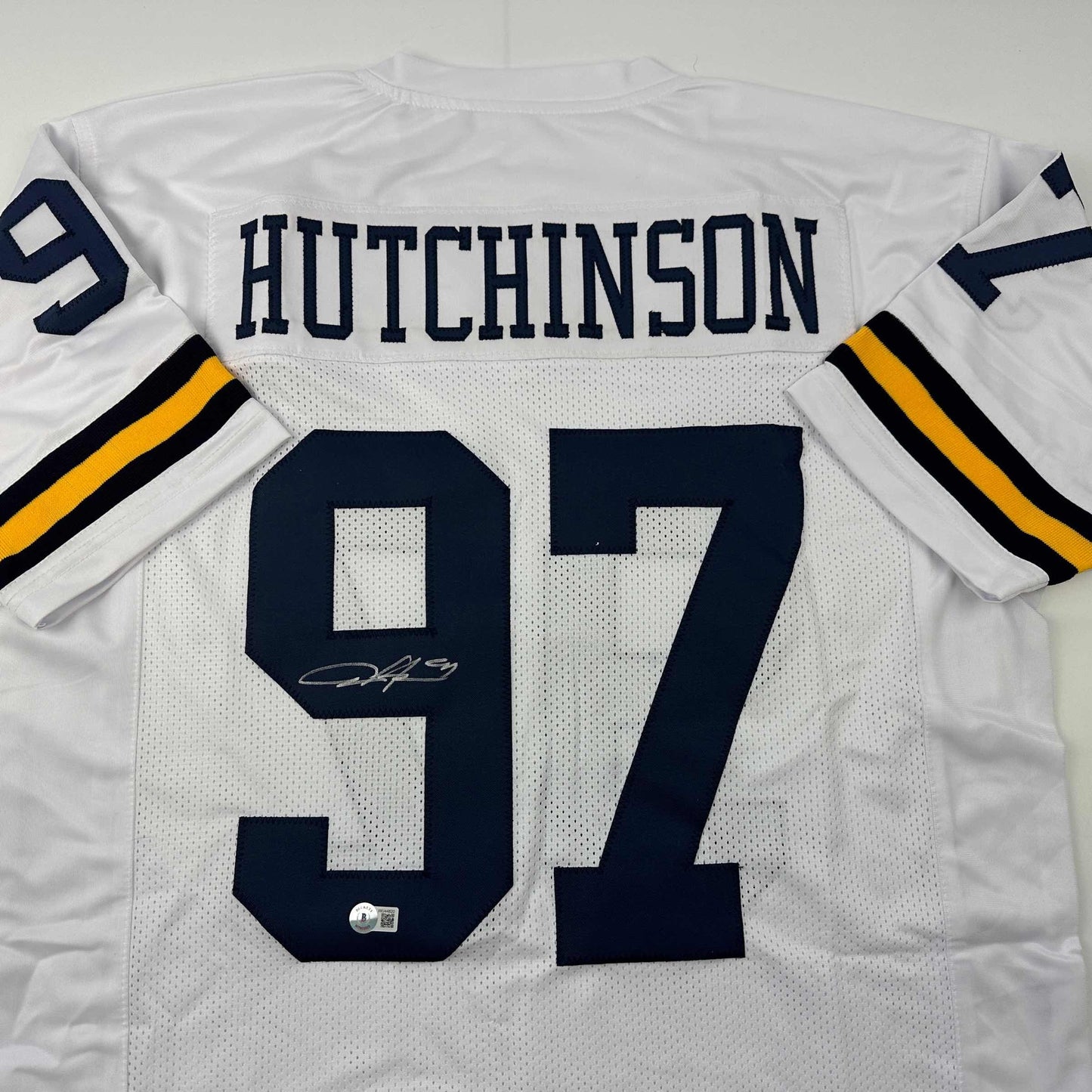 Autographed/Signed Aidan Hutchinson Michigan White College Football Jersey Beckett BAS COA