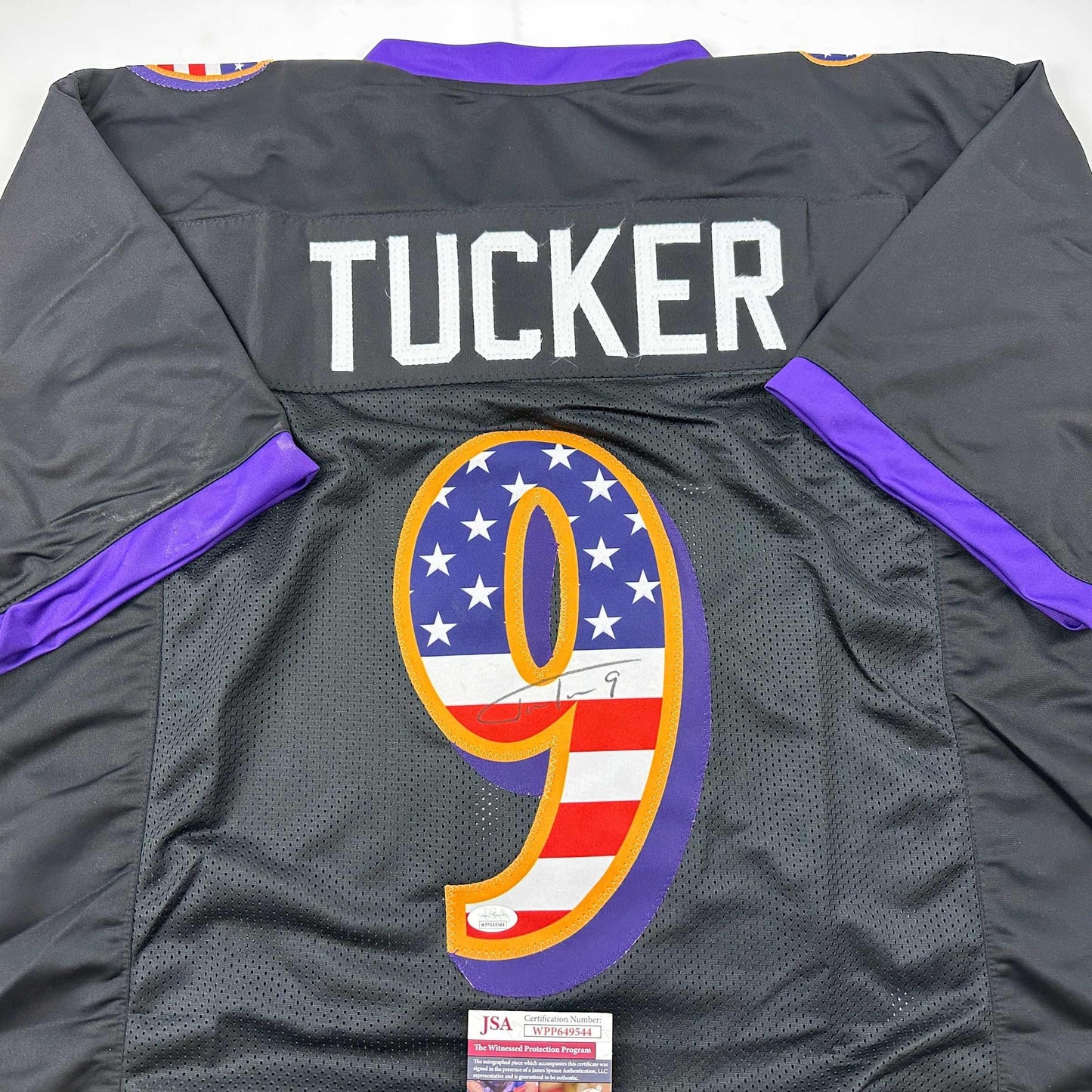 Autographed/Signed Justin Tucker Baltimore Black USA American Flag Football Jersey JSA COA