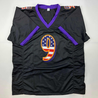 Autographed/Signed Justin Tucker Baltimore Black USA American Flag Football Jersey JSA COA