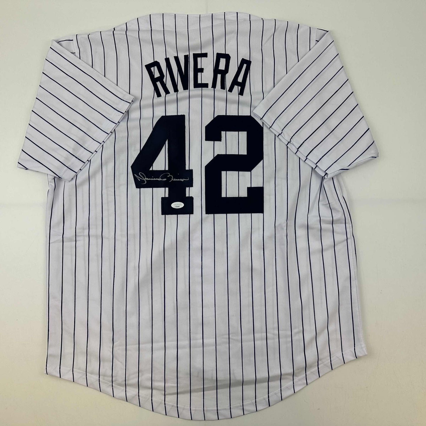 Autographed/Signed Mariano Rivera New York Pinstripe Baseball Jersey JSA COA/LOA