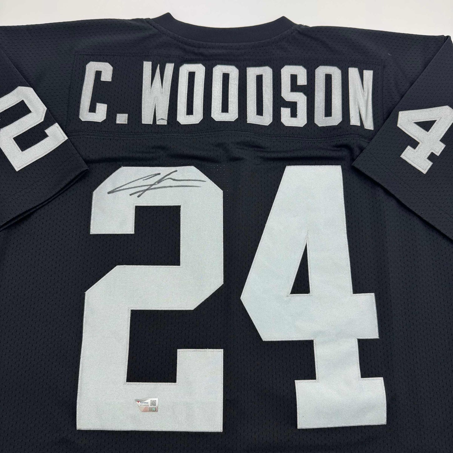 Autographed/Signed Charles Woodson Oakland Raiders Black Mitchell & Ness Football Jersey Fanatics COA