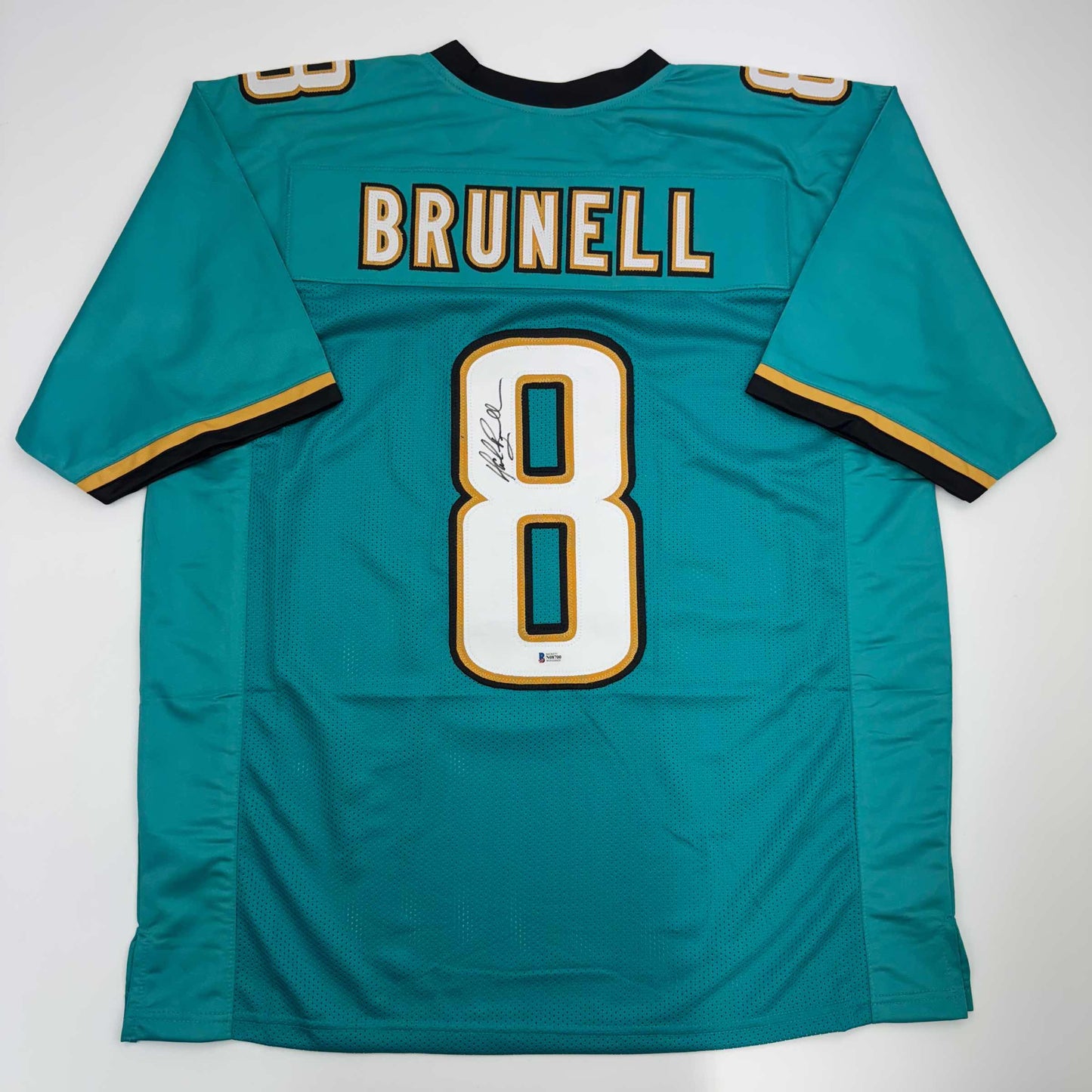 Autographed/Signed Mark Brunell Jacksonville Teal Football Jersey Beckett BAS COA