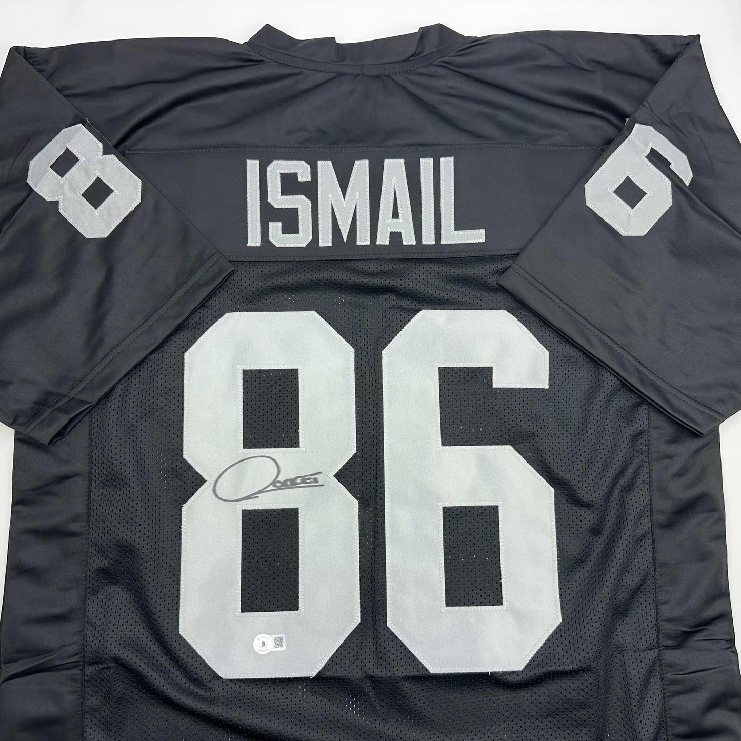 Autographed/Signed Raghib Ismail Rocket Oakland Black Football Jersey Beckett BAS COA