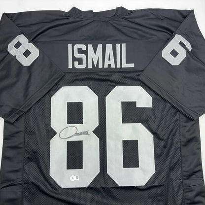 Autographed/Signed Raghib Ismail Rocket Oakland Black Football Jersey Beckett BAS COA