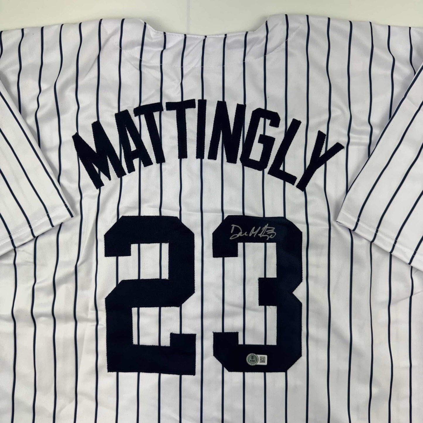 Autographed/Signed Don Mattingly New York Pinstripe Baseball Jersey Beckett BAS COA