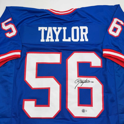 Autographed/Signed Lawrence Taylor New York Blue Football Jersey Beckett BAS COA
