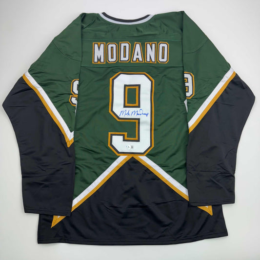 Autographed/Signed Mike Modano Dallas Dark Green Hockey Jersey Beckett BAS COA