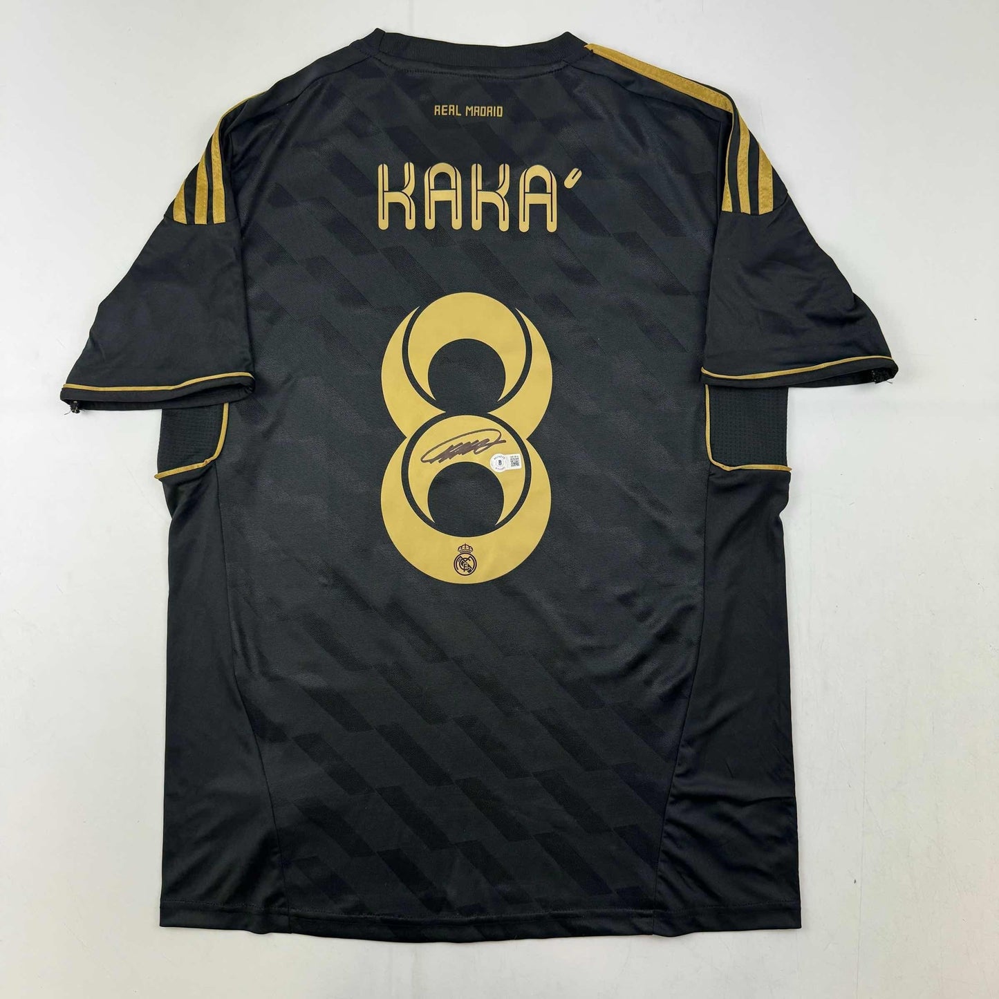 Autographed/Signed Ricardo Kaka Real Madrid Black Retro Soccer Futbol Jersey Beckett BAS COA