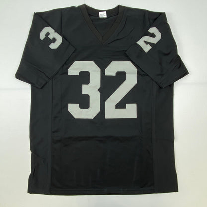 Autographed/Signed Jack Tatum Oakland Black Football Jersey JSA COA #1