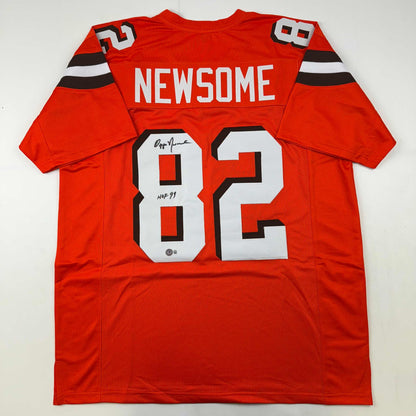 Autographed/Signed Ozzie Newsome Cleveland Football Orange Jersey Beckett BAS COA Holo