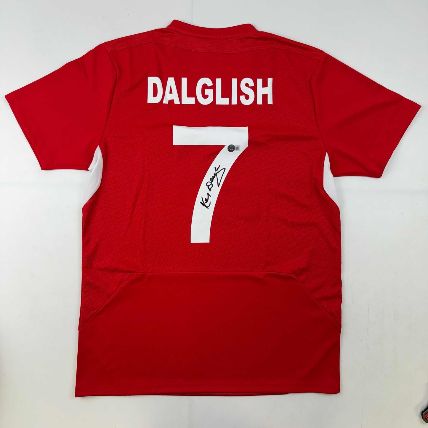 Autographed/Signed Kenny Dalglish Liverpool Red Carlsberg Soccer Jersey Beckett BAS COA