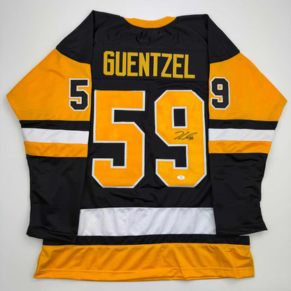Autographed/Signed Jake Guentzel Pittsburgh Black Hockey Jersey PSA/COA