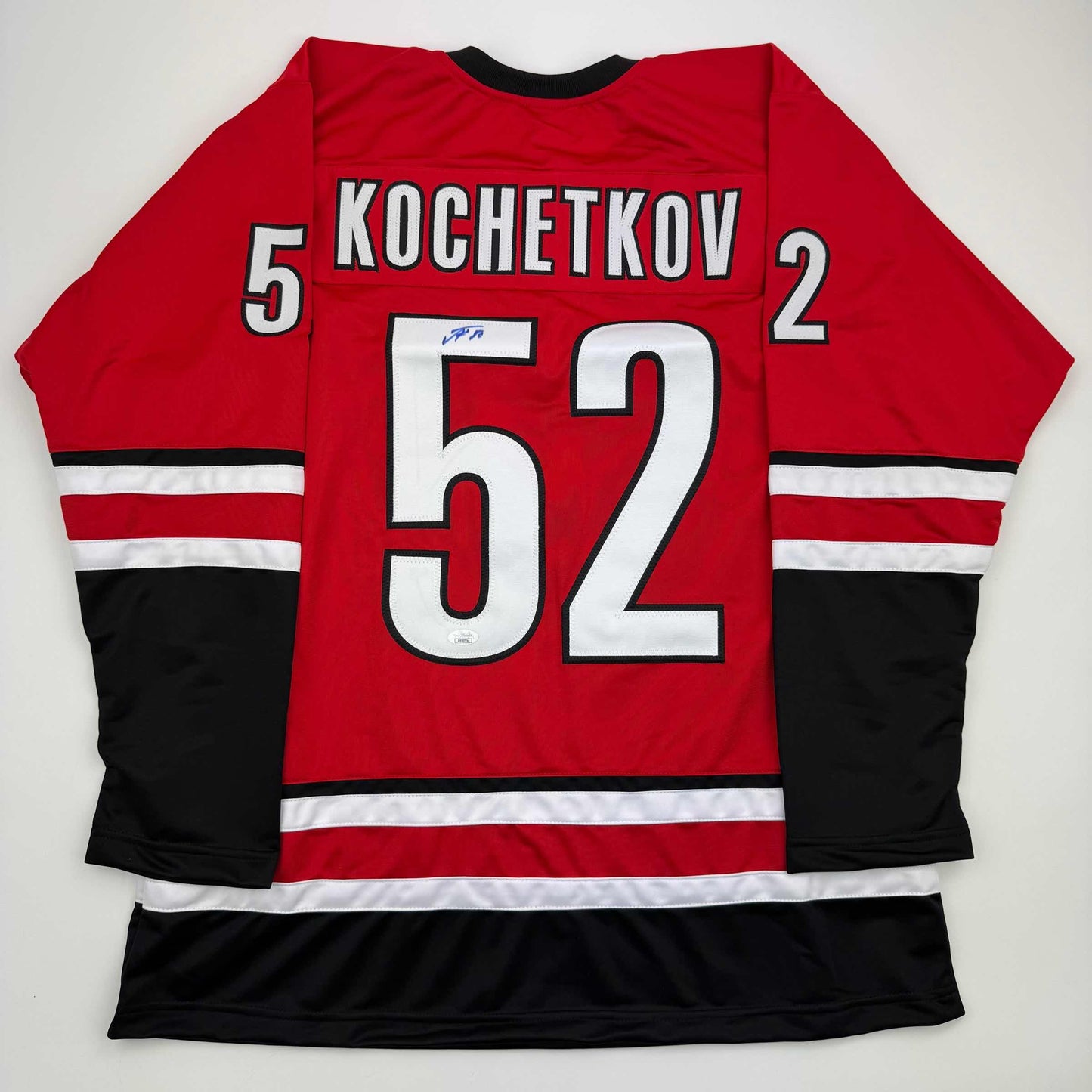 Autographed/Signed Pyotr Kochetkov Carolina Red Hockey Jersey JSA COA