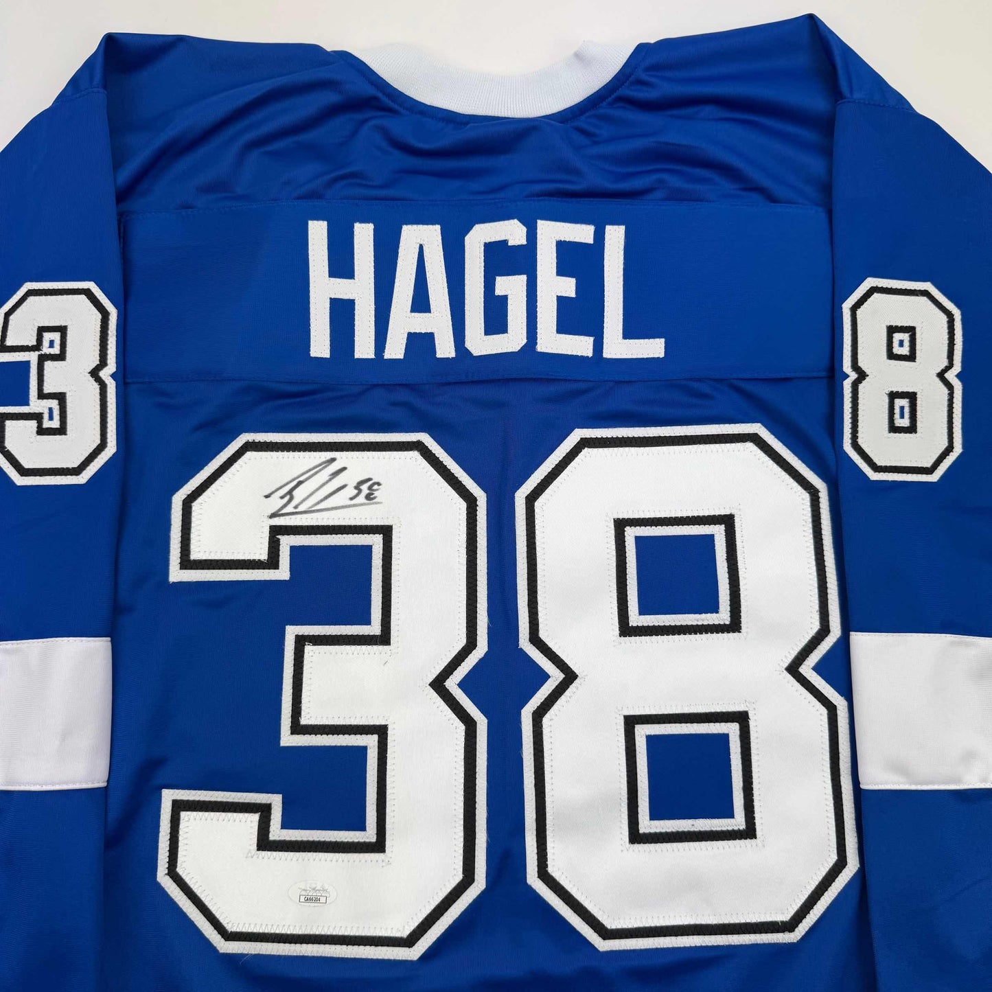 Autographed/Signed Brandon Hagel Tampa Bay Blue Hockey Jersey JSA COA