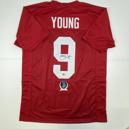 Autographed/Signed Bryce Young Alabama Red College Football Jersey Beckett BAS COA