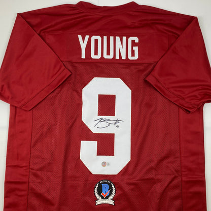 Autographed/Signed Bryce Young Alabama Red College Football Jersey Beckett BAS COA