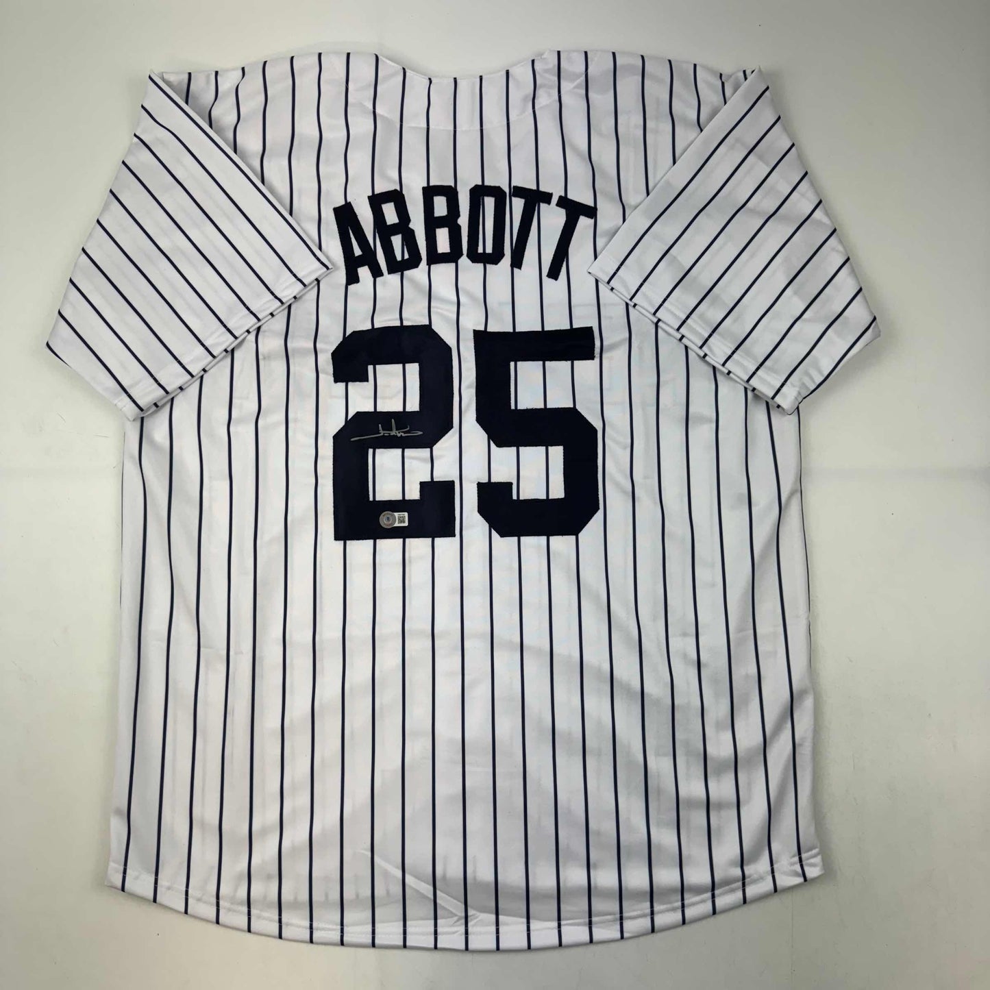 Autographed/Signed Jim Abbott New York White Pinstripe Baseball Jersey Beckett BAS Holo