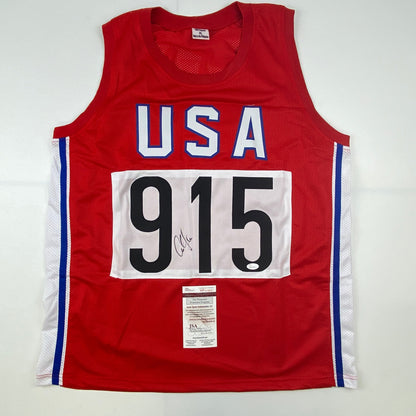 Autographed/Signed Carl Lewis Track Star United States USA Olympics Jersey JSA COA