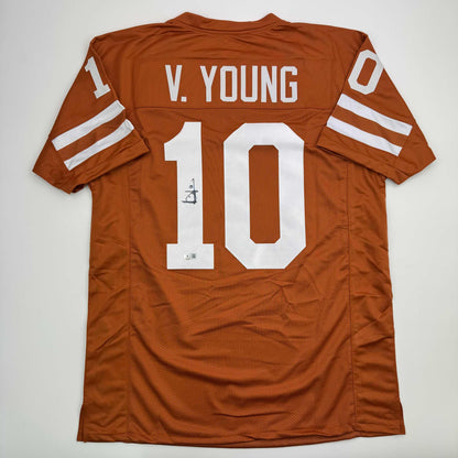 Autographed/Signed Vince Young Texas Orange College Football Jersey Beckett BAS COA