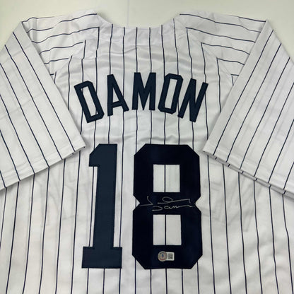 Autographed/Signed Johnny Damon New York Pinstripe Baseball Jersey Beckett BAS COA