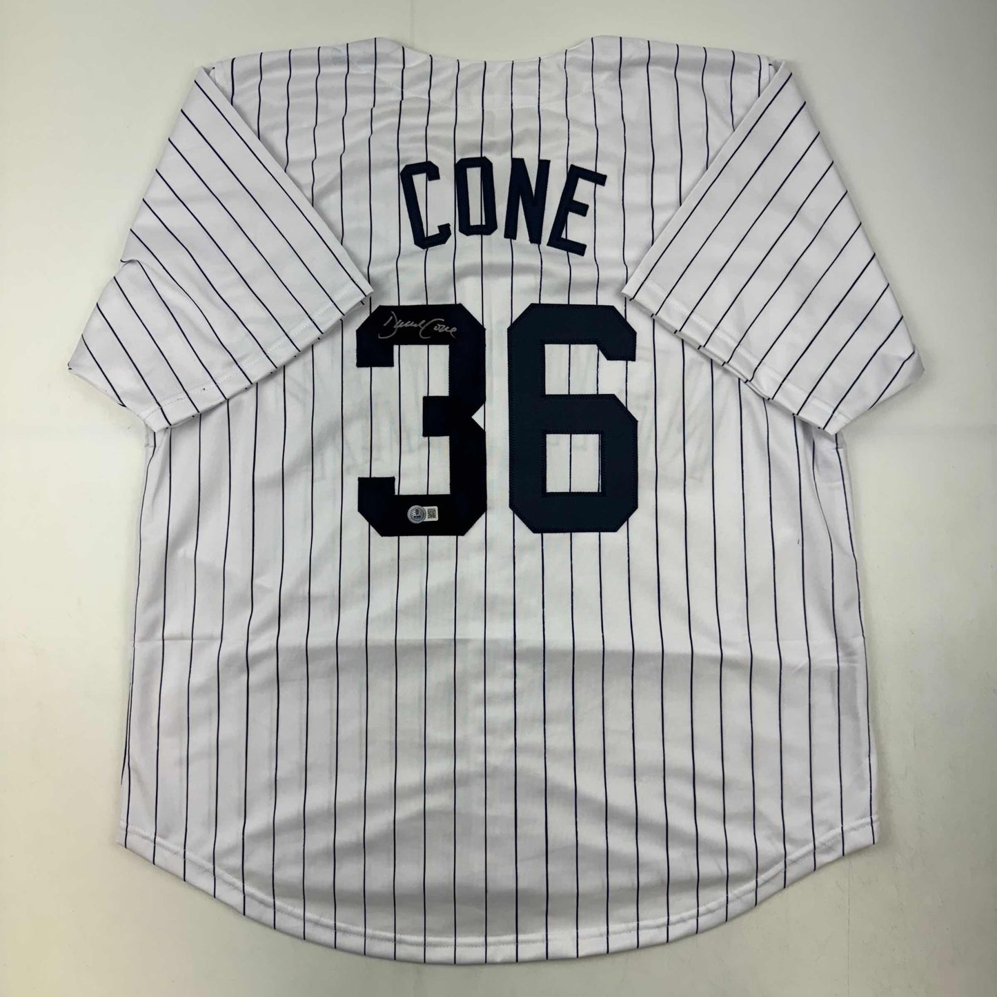 Autographed/Signed David Cone New York Pinstripe Baseball Jersey Beckett BAS COA