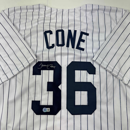 Autographed/Signed David Cone New York Pinstripe Baseball Jersey Beckett BAS COA