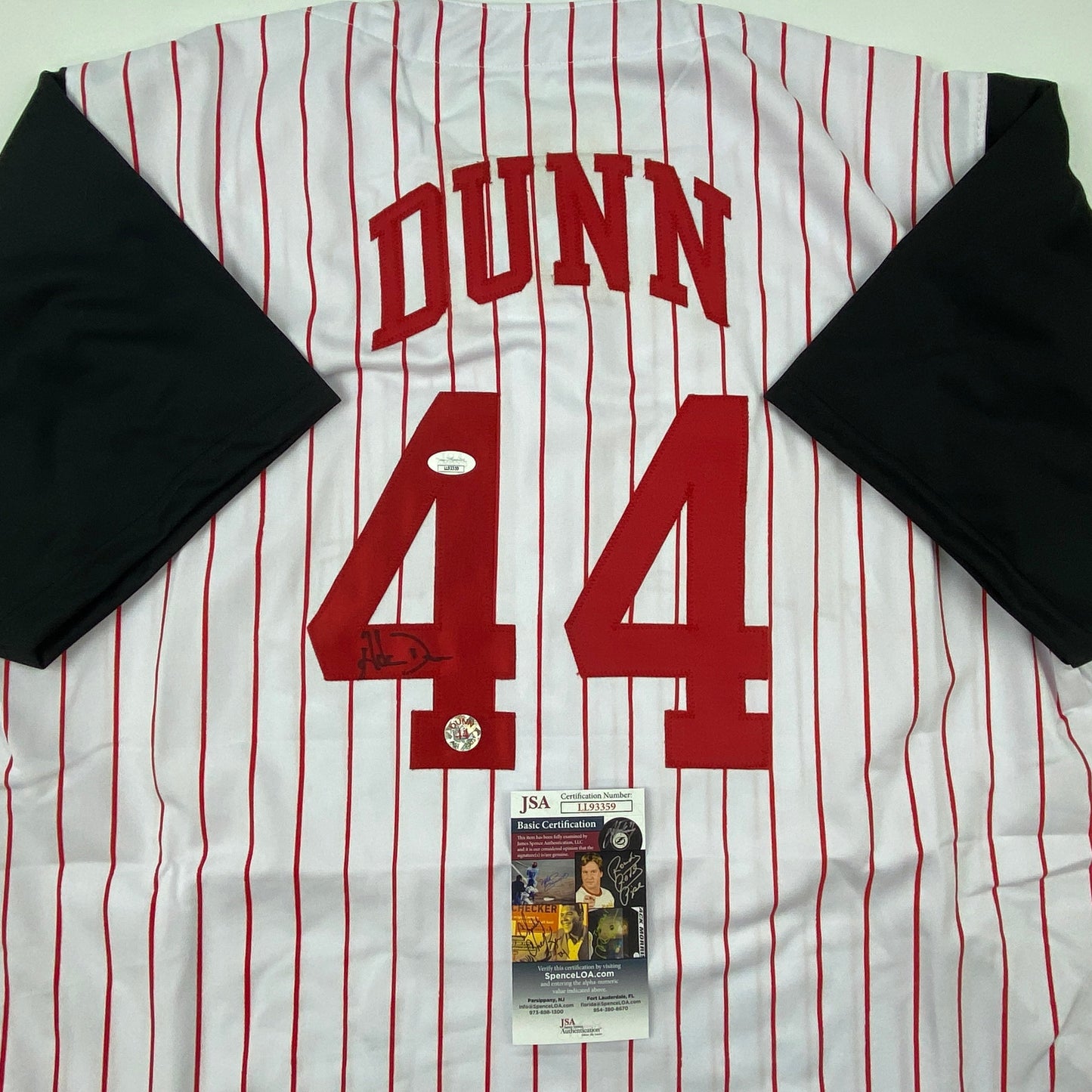 Autographed/Signed Adam Dunn Cincinnati Pinstripe Baseball Jersey JSA COA