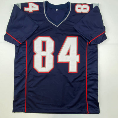 Autographed/Signed Deion Branch #84 New England Blue Football Jersey JSA COA