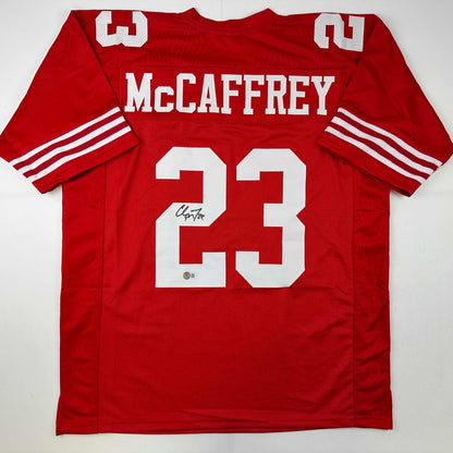 Autographed/Signed Christian McCaffrey San Francisco Red Football Jersey Beckett BAS COA