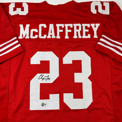 Autographed/Signed Christian McCaffrey San Francisco Red Football Jersey Beckett BAS COA