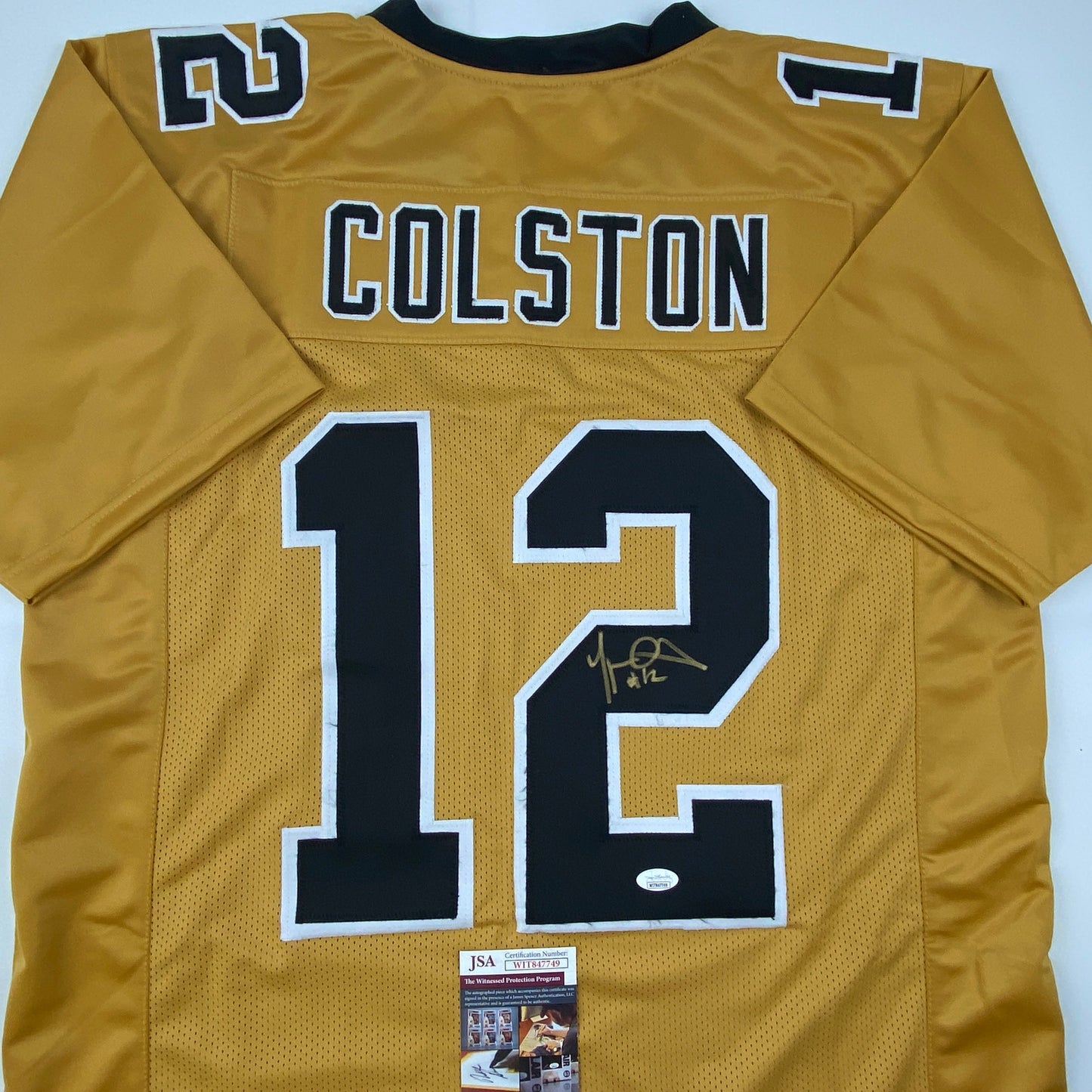 Autographed/Signed Marques Colston New Orleans Gold Football Jersey JSA COA