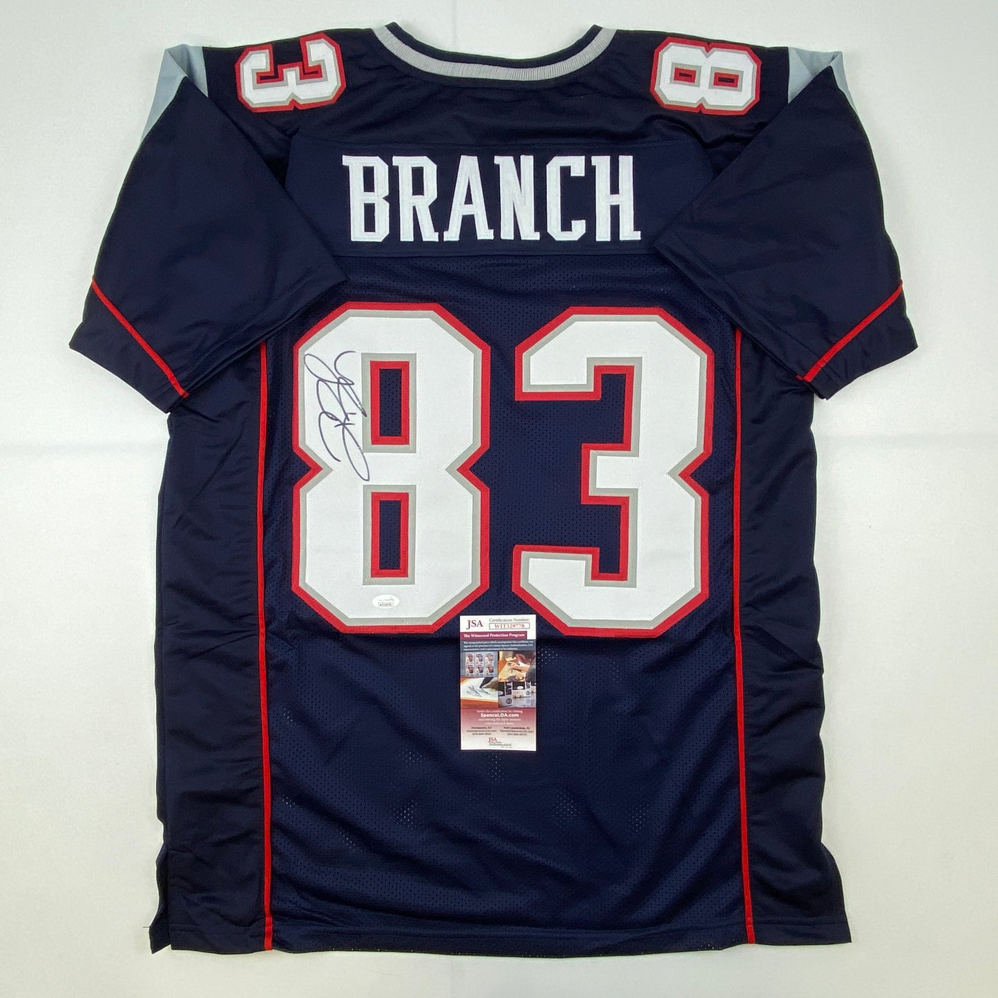 Autographed/Signed Deion Branch #83 New England Blue Football Jersey JSA COA