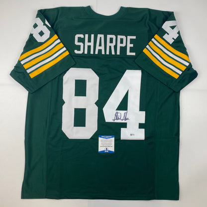 Autographed/Signed Sterling Sharpe Green Bay Green Football Jersey Beckett BAS COA