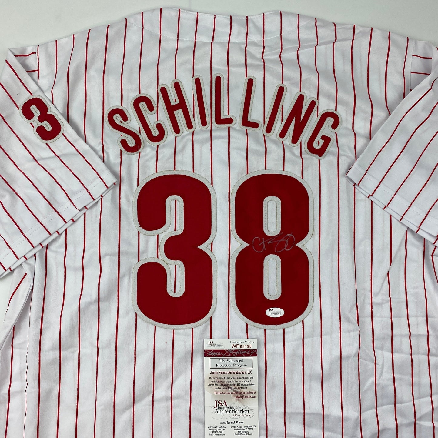Autographed/Signed Curt Schilling Philadelphia Pinstripe Baseball Jersey JSA COA