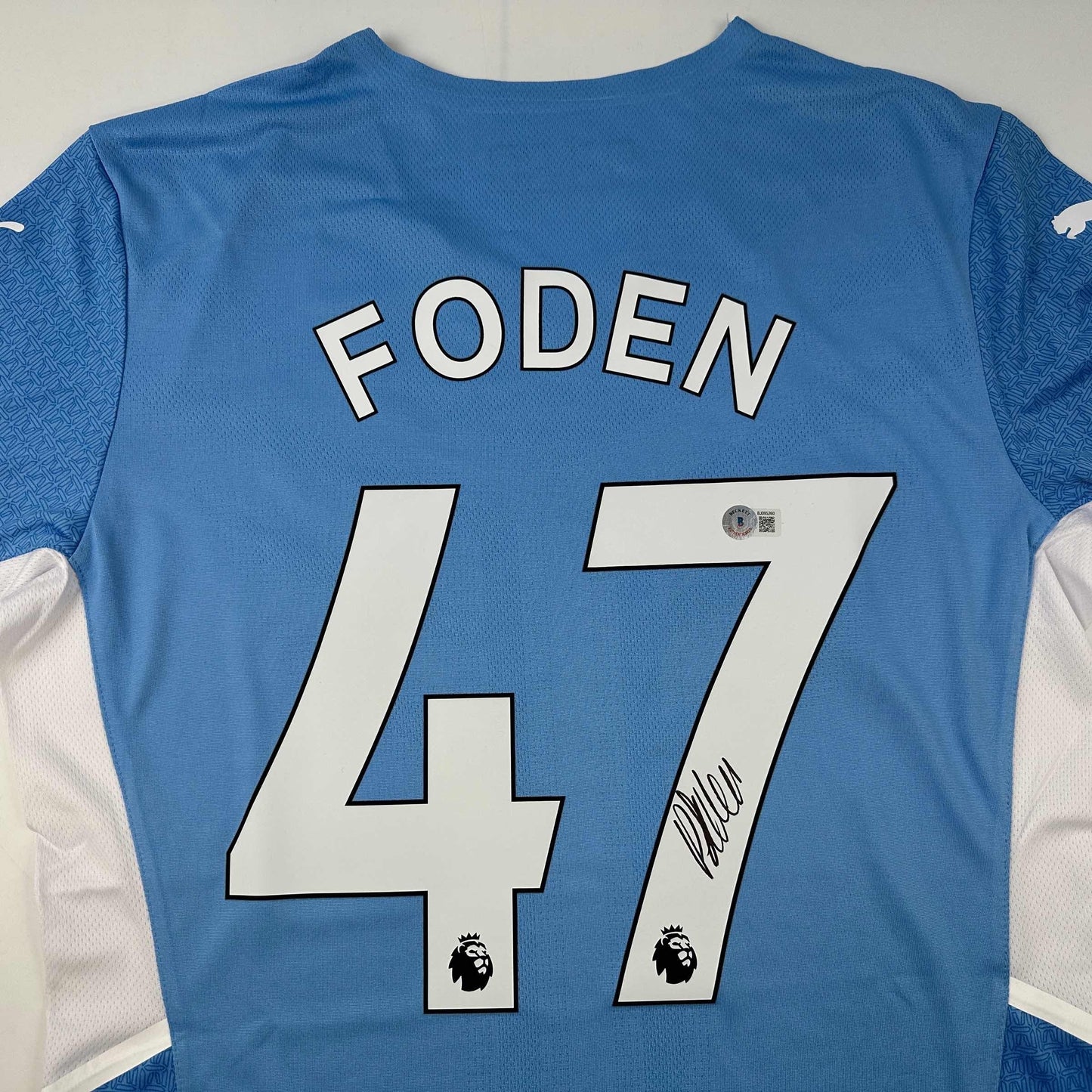 Autographed/Signed Phil Foden Manchester City Blue Soccer Futbol Jersey Beckett BAS COA
