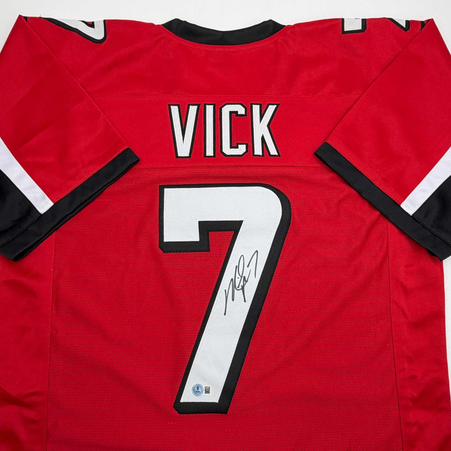 Autographed/Signed Michael Mike Vick Atlanta Red Football Jersey Beckett BAS COA