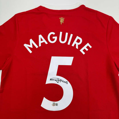 Autographed/Signed Harry Maguire Manchester United Red Soccer Jersey Beckett BAS COA