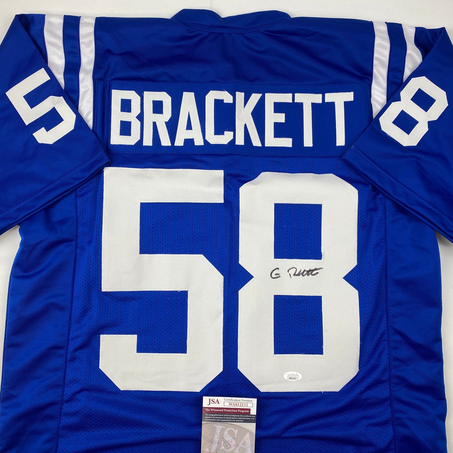 Autographed/Signed Gary Brackett Indianapolis Blue Football Jersey JSA COA