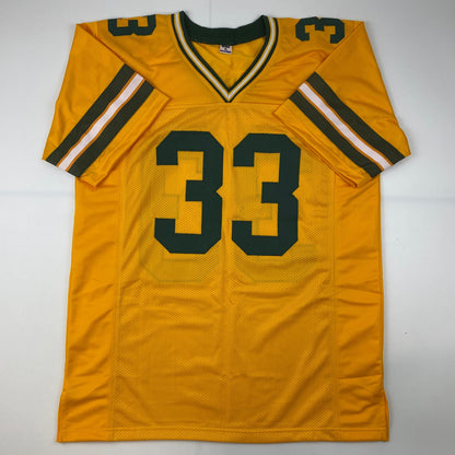 Autographed/Signed Aaron Jones Green Bay Yellow Football Jersey Beckett BAS COA