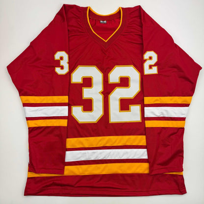 Autographed/Signed Dustin Wolf Calgary Red Hockey Jersey Beckett BAS COA