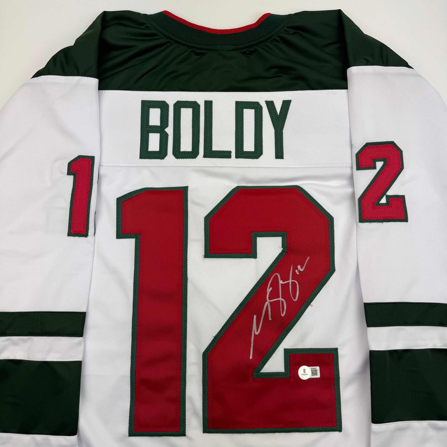 Autographed/Signed Matt Boldy Minnesota White Hockey Jersey Beckett BAS COA