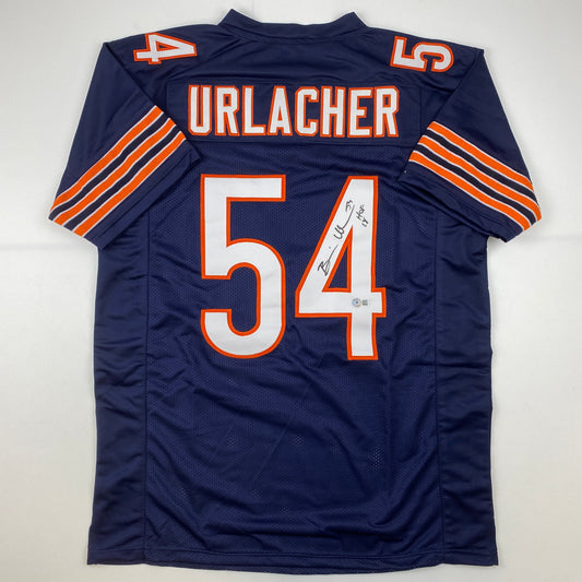 Autographed/Signed Brian Urlacher HOF 18 Chicago Blue Football Jersey Beckett BAS COA