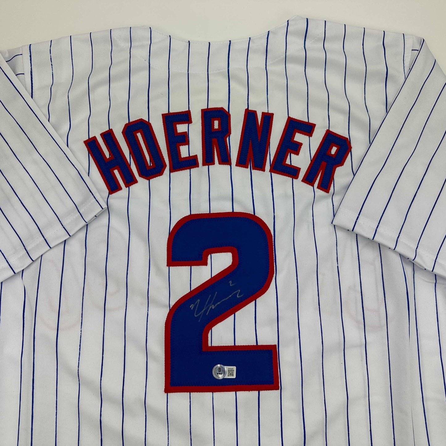 Autographed/Signed Nico Hoerner Chicago Pinstripe Baseball Jersey Beckett BAS COA