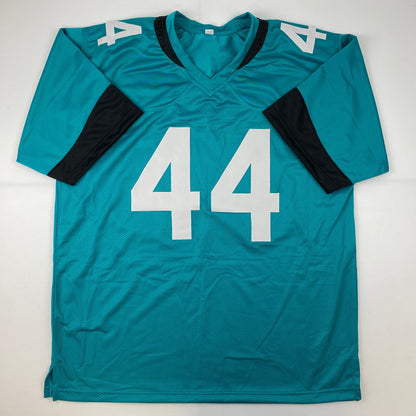 Autographed/Signed Travon Walker Jacksonville Teal Football Jersey Beckett BAS COA