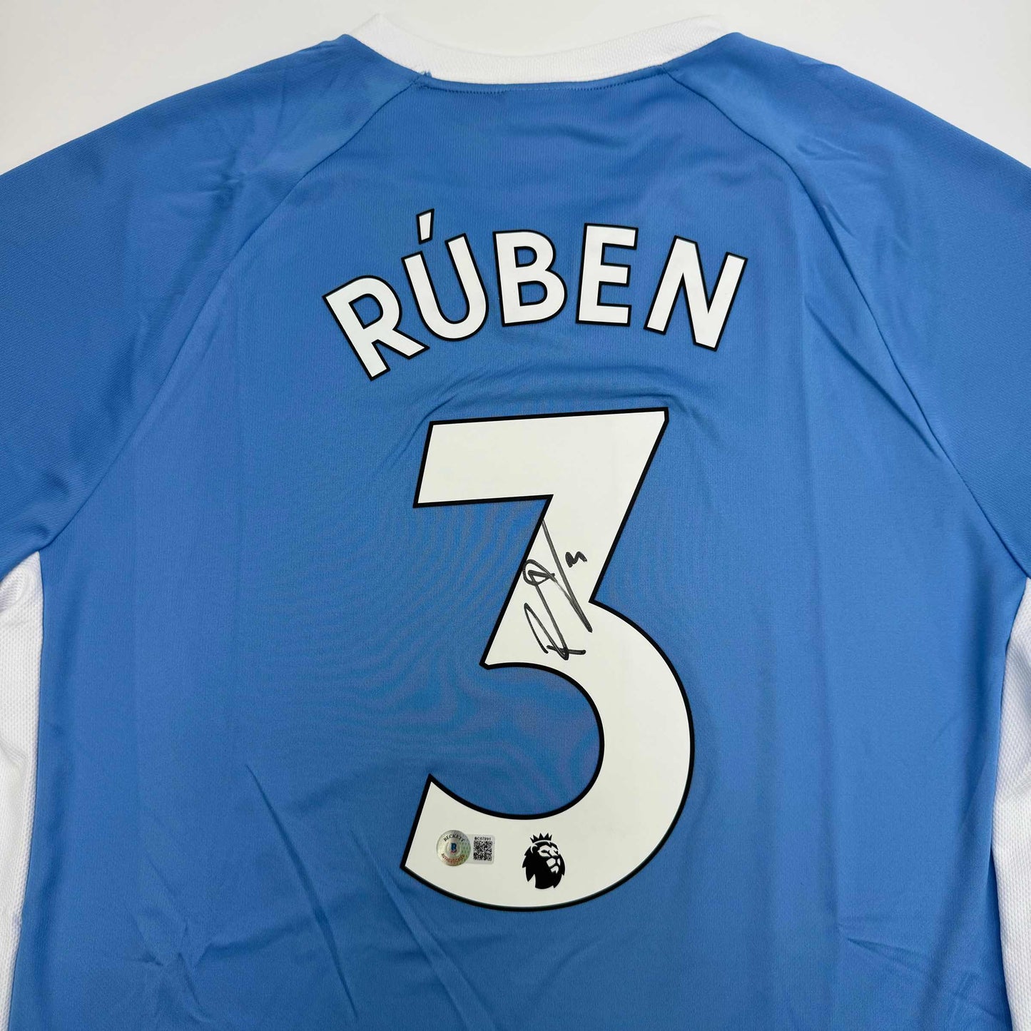 Autographed/Signed Ruben Dias Manchester City Blue Soccer Futbol Jersey Beckett BAS COA #2